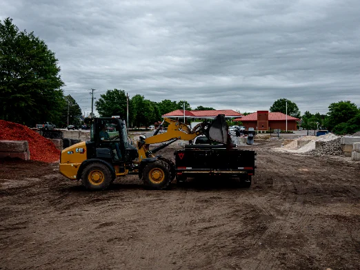 Loader filling a truck